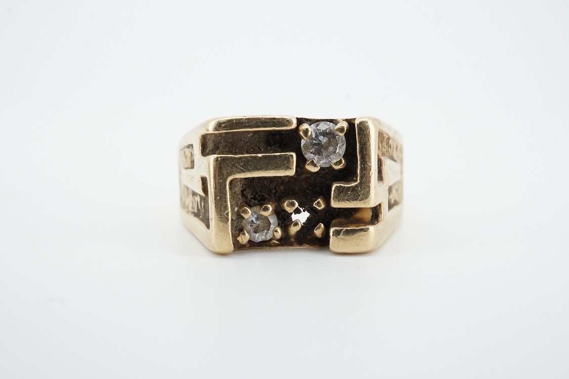 A 10k and two stone diamond set ring, size R/S, together with a damaged 9k and diamond cluster set signet ring, gross weight 13.5 grams.